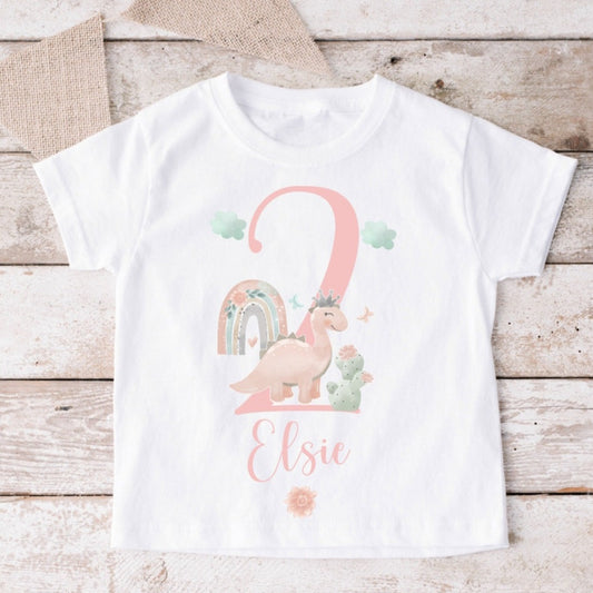 Personalised girls dinosaur birthday t-shirt in pink, perfect for themed parties and birthdays, made from soft polyester-cotton blend, printed with safe inks, customizable with child's name and age